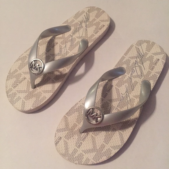 Michael Kors Shoes - Michael Kors white silver flip flops